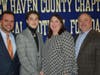 Lyman Hall's Cameron Pragano with parents Patti and Sean Pragano (right) and coach C.J. Monroe.