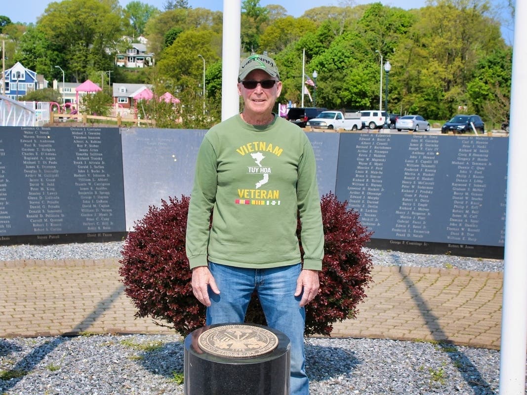 West Haven Army veteran Mark Levine stands behind the granite U.S. Army insignia marker at the city’s Vietnam Veterans Memorial in Bradley Point Park. Levine, who served in the Vietnam War in 1970-71, will lead West Haven’s Memorial Day parade on May 29.
