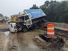 A box truck crashed over the concrete barrier on the left side of the highway within a construction zone on I-95 South in Westport on Tuesday.