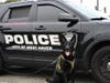 Brittany Murphy, 28, said a goal of her was to meet 100 police dogs by the end of 2022, which she accomplished on the last day of the year.