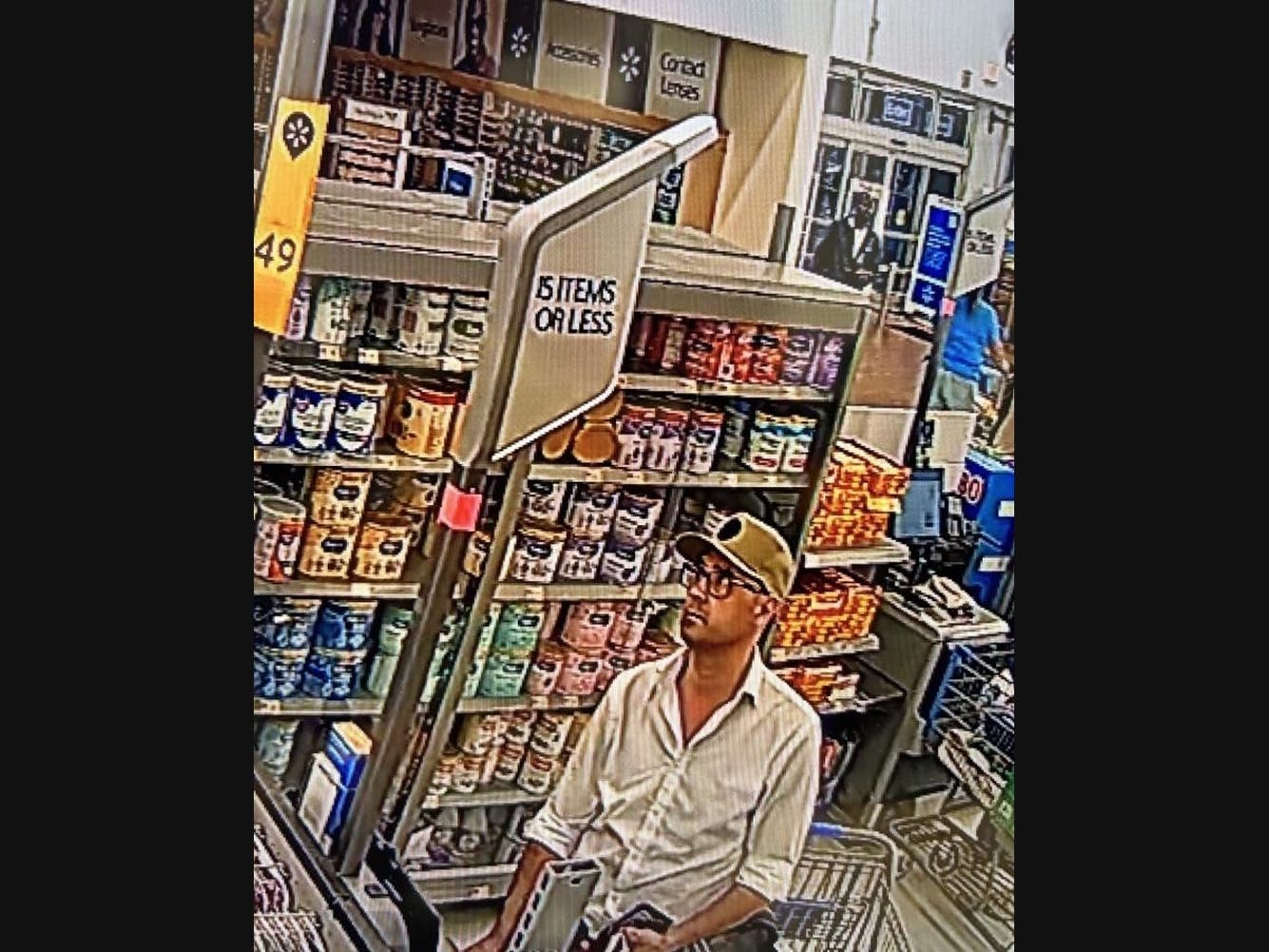 Surveillance image of the man accused of putting a skimming device on the self-checkout register at Walmart in Stratford.