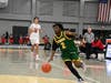 Hamden senior Anthony Aurora dribbles the ball during Monday's loss to Wilbur Cross in the MLK Classic in New Haven.