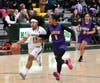 Hamden junior Saige Sampson makes her way through the Career defense on Thursday night at Hamden High School.