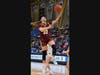 Sheehan senior Megan Wresien drives to the basket against Sacred Heart Academy. Wresien scored a game-high 15 points for the Titans.