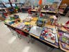 A classroom at E.C. Stevens Elementary School in Wallingford was transformed into the Giving Tree shop for a holiday shopping experience for families in need just before the holiday recess in December.