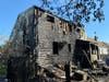 Crews extinguished a three-alarm fire that involved two homes on Boswell Avenue in Stratford on Tuesday, according officials.