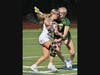 Senior co-captain Ellie Madancy tries to make her way past a Hamden defender in Tuesday's game in Wallingford. Madancy finished with nine goals and three assists to lead Lyman Hall to a 16-7 victory.