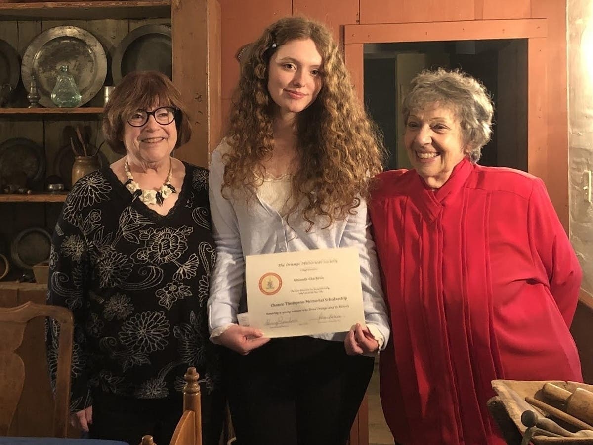 Pictured: Scholarship award winner Amanda Giachino (center) with Orange Historical Society President Ginny Reinhard (right) and Scholarship Chair Alice Kasten (left).