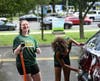 Hamden girls soccer players at the team's fundraising car wash on Sunday.