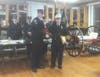 Toms River Fire Co. 1 President Josh Prizer presents Richard "Dick" Beck with a plaque honoring 60 years of service.