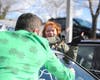 A young woman who'd waited through the night is excited by the price cut on a car she liked. 