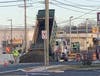 A dump truck deposits material on Monday at the north end of the remaining Route 166 construction in Toms River. 