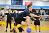 A player leaps to avoid a throw at the Toms River PBA Dodgeball Tournament at Toms River East.