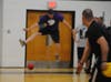 A player leaps to avoid a throw at the Toms River PBA Dodgeball Tournament at Toms River East.