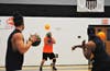 A player tries to avoid multiple balls at the Toms River PBA Dodgeball Tournament at Toms River East.