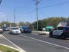 A motorcycle lies in the road on Route 88 Thursday after a crash. Brick police said the cyclist suffered minor injuries.
