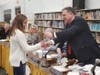 Rory Dunckley receives a Manchester Hawks pin from Superintendent David Trethaway after her Hawks Pride presentation. 