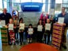 The Brownies at Gateway Toyota with the donations from the dealership. 