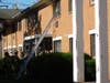 Smoke billows from an apartment window in Toms River where a woman and her cat were rescued. 