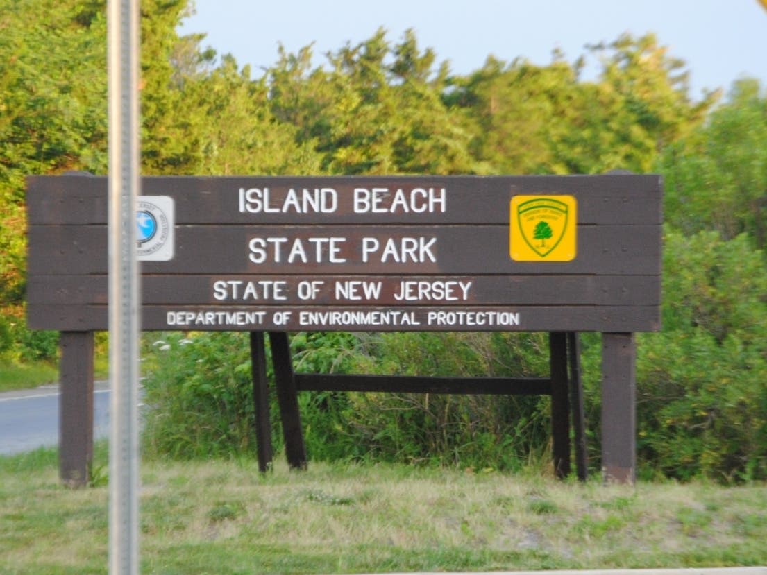 A teen had to be rescued after getting caught in rough surf at Island Beach State Park, officials said. 