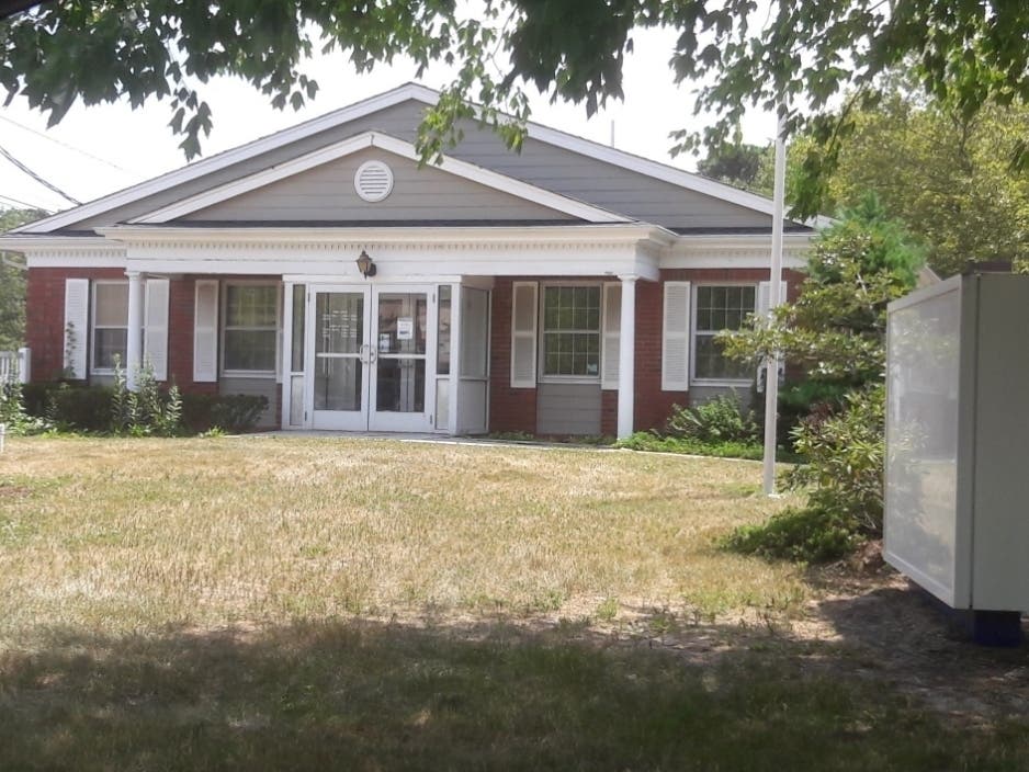 The fight over the future of a former bank on Adamston Road has moved to court, with the filing of a lawsuit against the Brick zoning board.