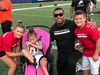 Kristianna, Leigha and Joey Cirillos with Jonathan Casillas of the New York Giants at the USA Football Protection Corps event in August.