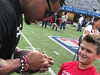 Jonathan Casillas signs a football for Joey Cirillo; Joey lost the ball Friday at the Toms River North football game.
