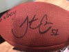 Jonathan Casillas's autograph on the new football he gave Joey Cirillo.