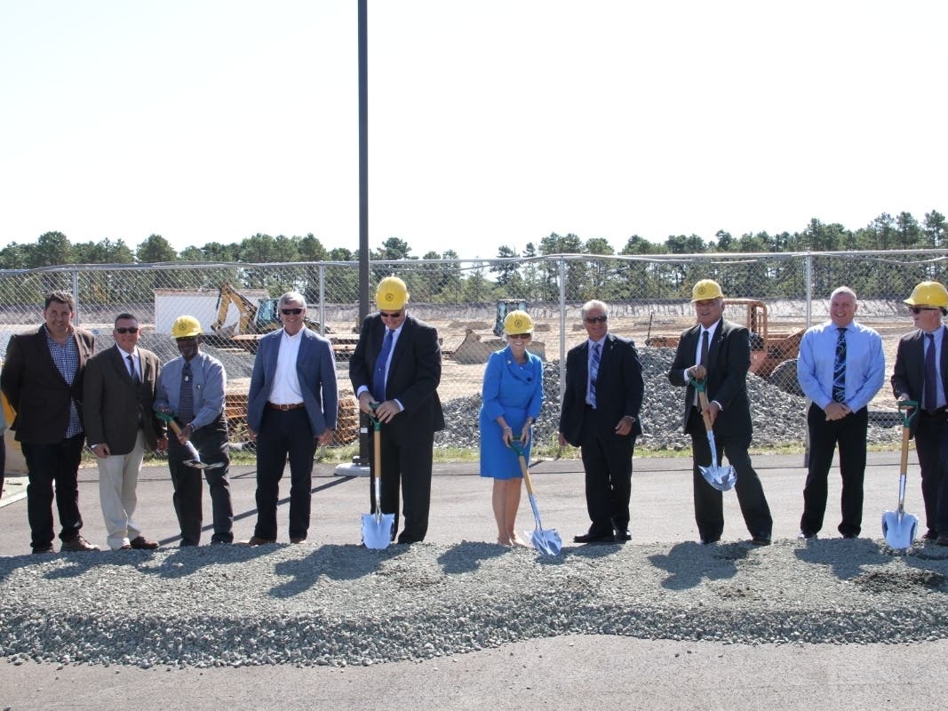 Ocean County Freeholder Director Virginia Haines and (to her left) Freeholder Gary Quinn help break ground on the new Ocean County Transportation Department facility in Manchester.