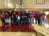 Teachers, staff, and South Toms River police and emergency services pose for a photo as they celebrated Miguel Alarcon, a beloved South Toms River boy batting brain cancer. 
