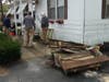 The old steps to the home are piled up to be discarded after they were removed to make way for the walker-friendly ones.