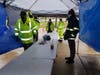 Tents have been set up to keep food boxes dry during Friday's food distribution event. South Toms River Elementary School is one of the sites.