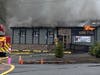 Firefighters battled the blaze at Alba's Pub near Center Street Friday morning. 