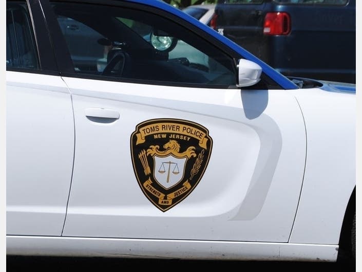 Toms River police are investigating the death of a Berkeley Township man found dead on a bench outside IHOP.