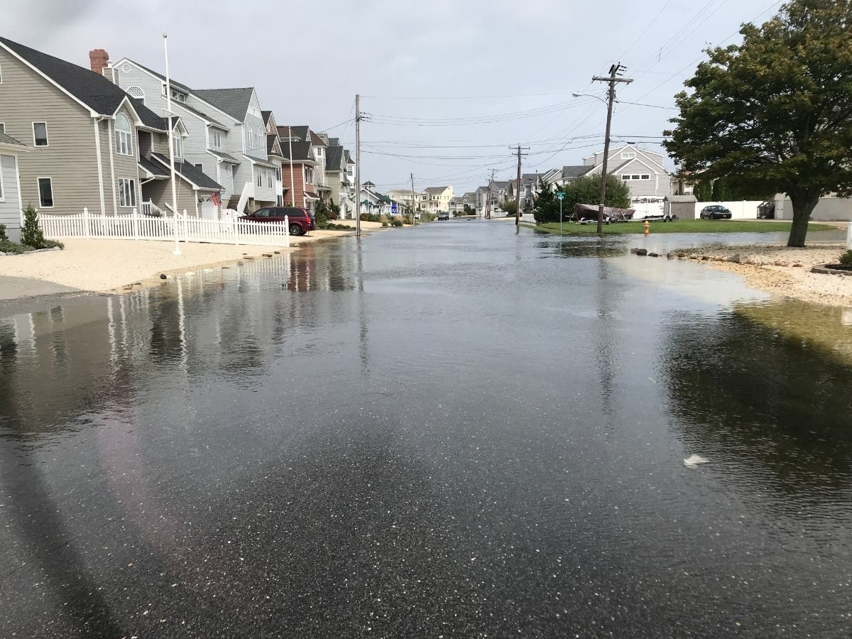 Water covers the road at Broad Street and Fifth Street in the Toms River portion of Normandy Beach. Flooded roads have become a persistent problem in the neighborhood.