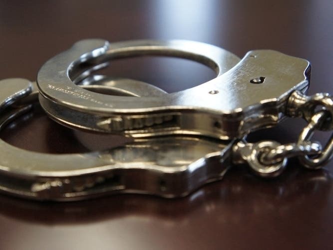 The three men were arrested after they parked in a driveway and tried to run off. 