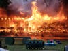 Flames consume a home on Beckerville Road in Manchester on Wednesday.