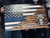 Liz Casterlin and Mark Buglio presented this flag to the Manchester Township Police Department as a thank you for the department's help after the fire