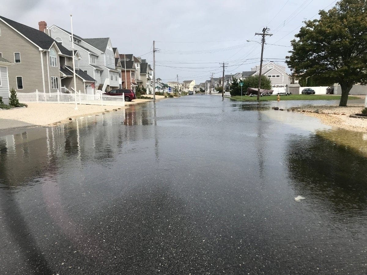 Water covers the road at Broad Street and Fifth Street in the Toms River portion of Normandy Beach. Flooded roads have become a persistent problem in the neighborhood.