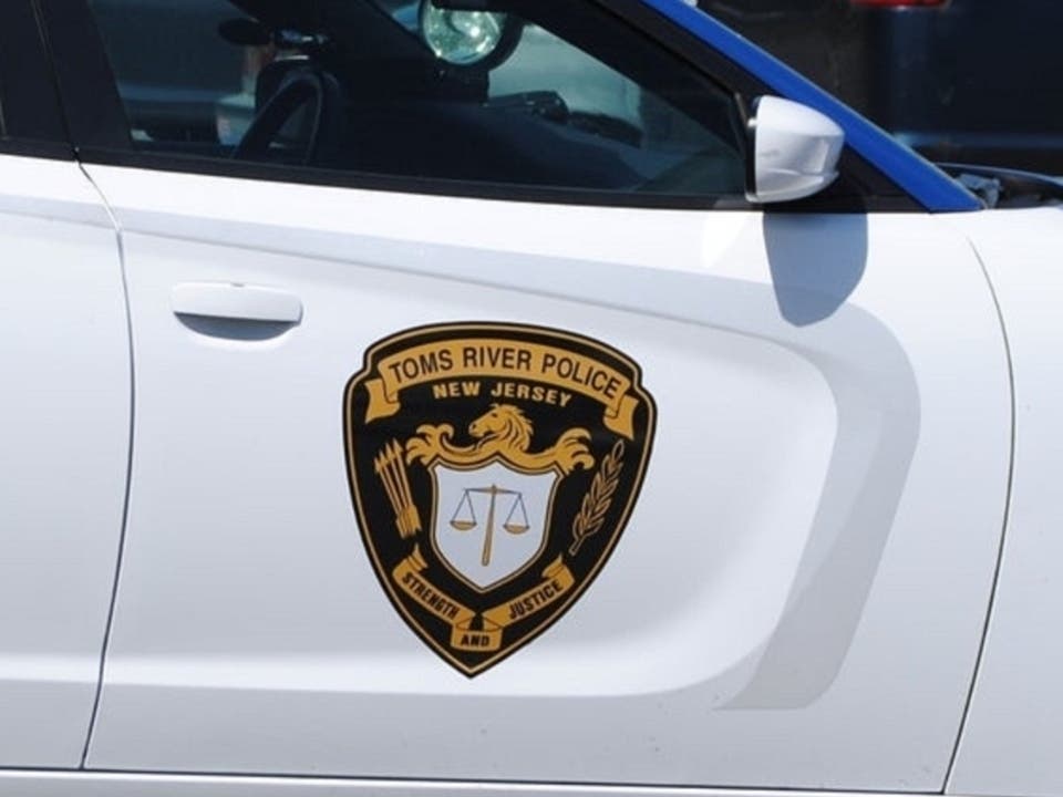 Toms River police charged a man with driving under the influence after a crash Sunday damaged two utility poles and knocked out power to several neighborhoods.