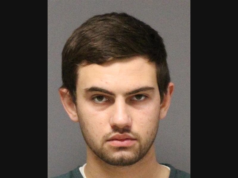 Connor White, 22, of Brick, has been arrested and charged in connection with threats made against a Brick detective and the detective's family. 