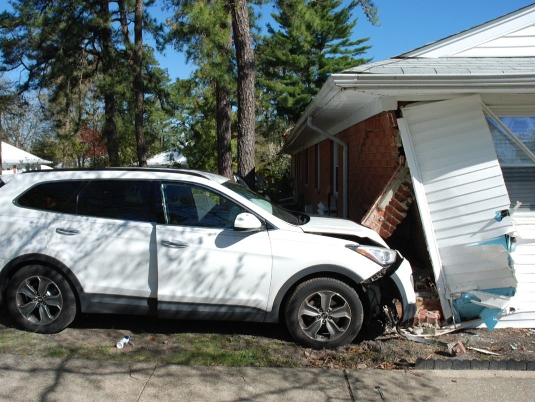 A sport utility vehicle crashed into a home on Bellhaven Court on Monday; police say the driver appeared to have a medical episode that caused the crash.