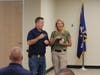 Capt. Robert Dolan, who will be sworn in as chief Thursday, and Manchester Police Chief Lisa Parker as Parker is celebrated on her final day leading the Manchester Police Department.
