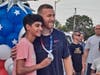 Todd Frazier posed with fans young and old on Monday. 