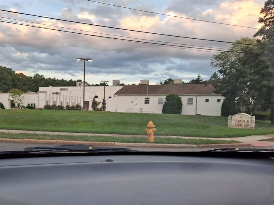 The former Temple Beth Or site is being operated as a school for Orthodox Jewish boys, without an approved site plan or permits. Brick Township is fining it $2,000 per day for failing to get the approvals. 