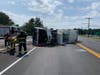 A Little Egg Harbor Township garbage truck overturned on Route 70 in Lakehurst on Wednesday. 