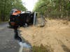 The Ocean County Road Department helped clean up the 24 tons of sand spilled on Pasadena Road. 