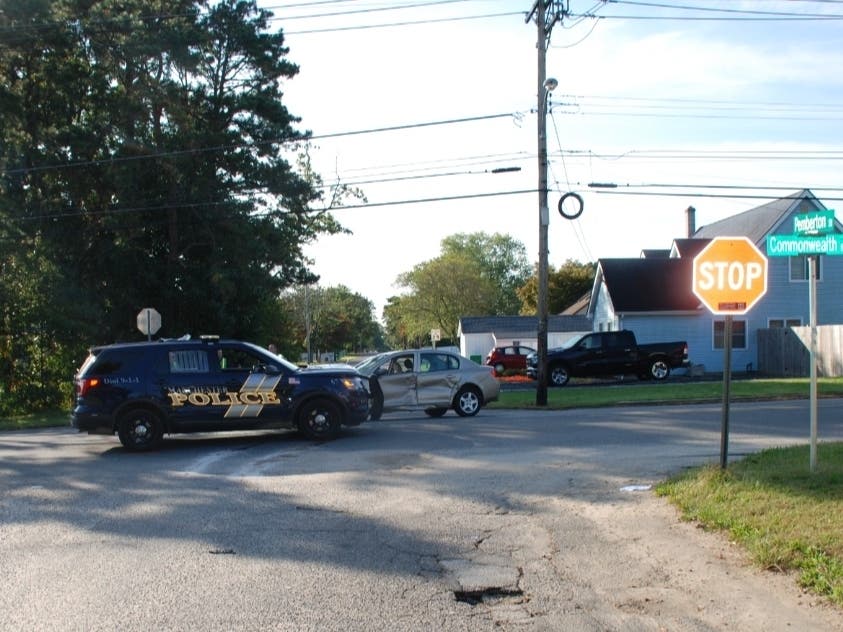 A Manchester Township police officer and a woman were injured in a two-vehicle crash Thursday morning, police said. 