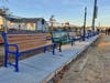 Benches line the area near the playground. Metal benches honor sponsors who made significant contributions, what Christian Kane said was a special thank you to them. Others honor smaller contributors.