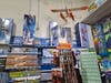 Model airplane kits and kites dominate a back wall at HobbyTown.